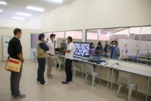 The-Chairman-U-Zaw-Zaw-and-Representatives-of-WHO-UNOPS-and-ICRC-checking-the-monitoring-room-at-Ayeyarwady-Center-300x201